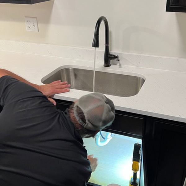 A plumber from JM Lapp providing plumbing service in New Holland, PA.